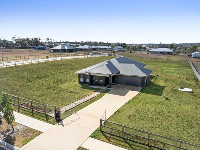Sophisticated Family Living on a Premium Corner Acreage