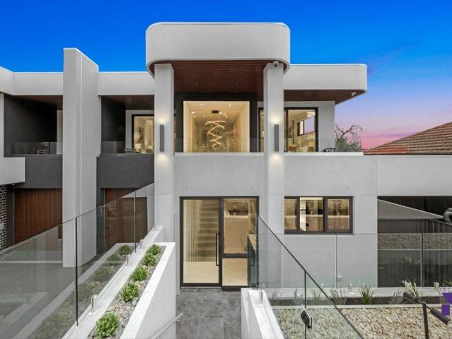 Sophisticated home fuses architectural elegance with resort inspired living