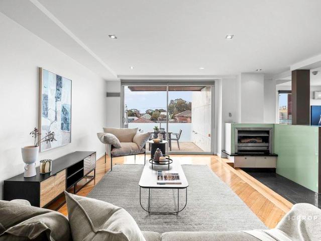 Sophisticated Inner North Living with Terrace & Fireplace