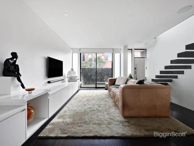 Sophisticated Inner City Living with Space, Style a Three Car Garage