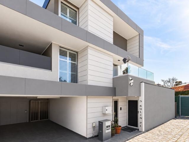 Sophisticated living within exclusive blue chip enclave