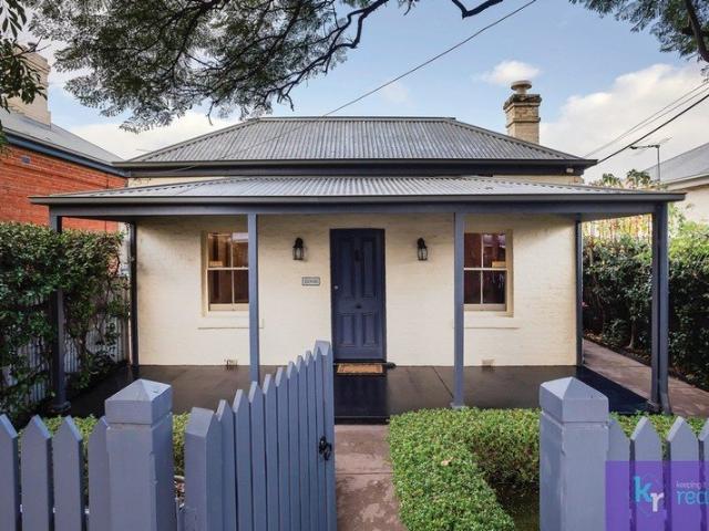 Sophisticated Living in Coveted Norwood Beyond Every Expectation