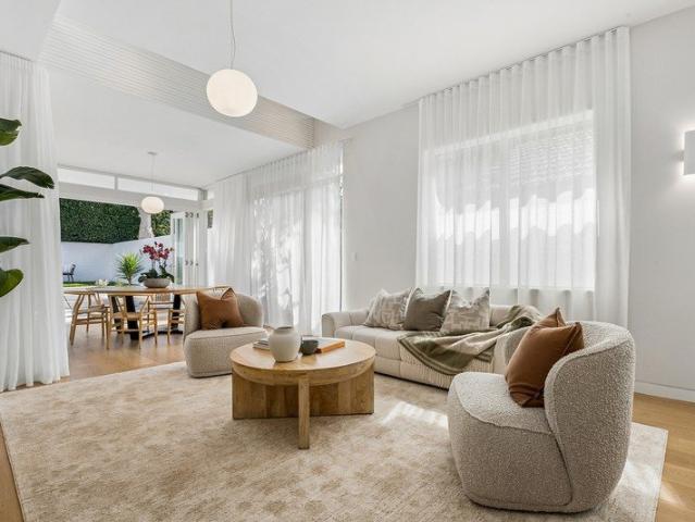 Sophisticated residence of relaxed modern luxury with elevated harbour views