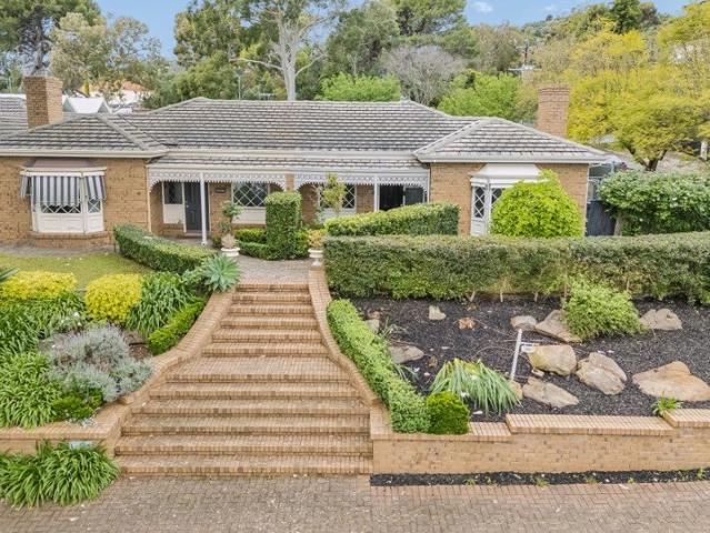 Sophisticated Single Level Living with Poolside Entertaining