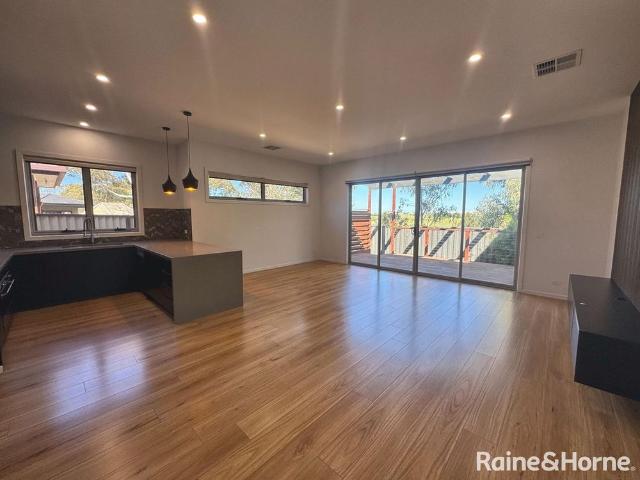 Sophisticated Single Level Living with Stunning Parkland Surrounds