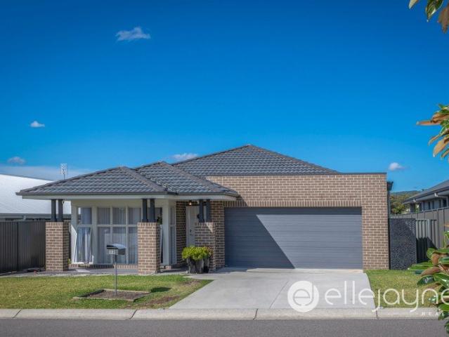 SOPHISTICATED SINGLE LEVEL MOJO HOME ON QUIET STREET IN WATAGAN PARK ESTATE COORANBONG