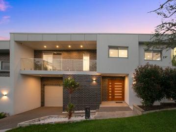 Sophisticated & spacious duplex, designed for ideal family living