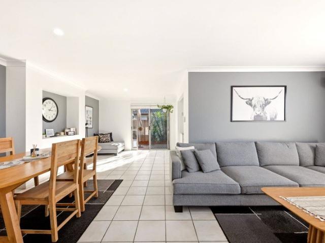 Sophisticated, Spacious & Exceptionally Private Townhome with Rare Double Garage