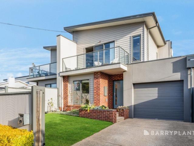 Sophisticated Two Level Living in the Heart of Belmont
