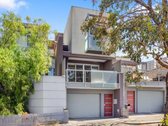 Sophisticated Three Level Townhouse in a Prime Lifestyle Location