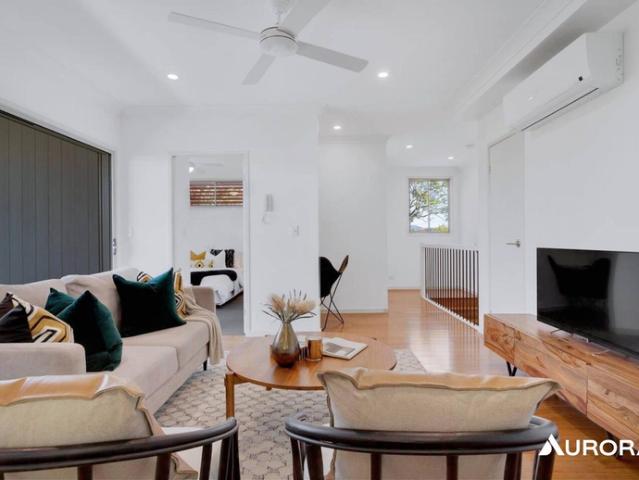 Sophisticated Townhouse In Unbeatable Position!