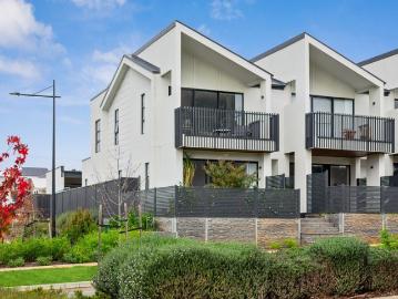 Sophisticated Townhouse Living with Elevated Views