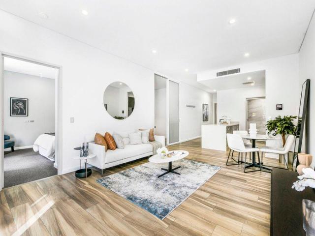 Sophisticated Townhouse Style Living with Private Courtyards