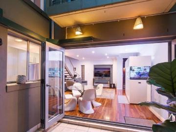 Sophisticated Tri Level Townhouse with Courtyard Oasis
