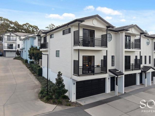 Sophisticated Tri Level Living in the Exclusive Motif Boutique Complex