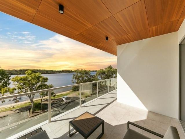 Sophisticated Waterfront Living with Stunning River Views!