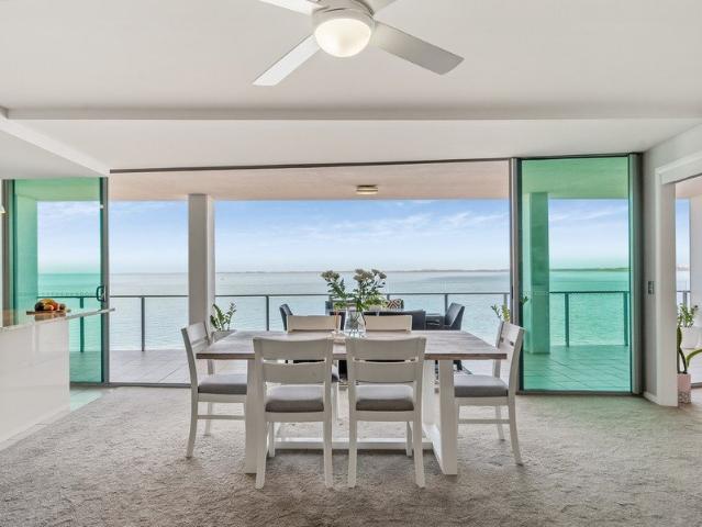 Sophisticated Waterfront Living With Sweeping Views!