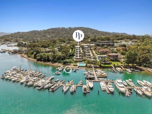 Waterfront Apartment with Private Berth & Pool.