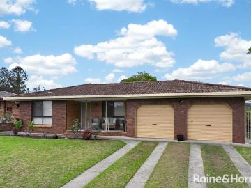 Sought After Area & Ground Level Brick Home