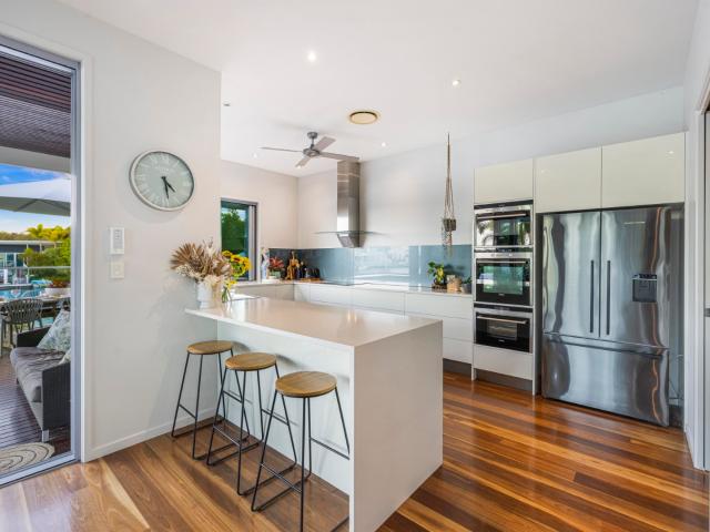 Sought after single level waterfront luxury in pelican waters