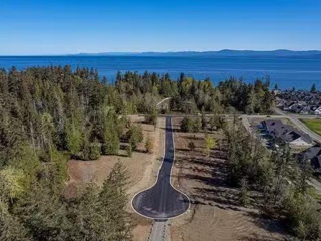 Sl14 Camassia Close, Qualicum Beach, BC, V9K 1G1 vacant land.