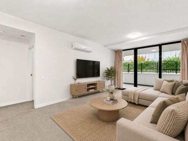 Sleek 1 Bedroom Plus Study Apartment with Pool & Metro Convenience