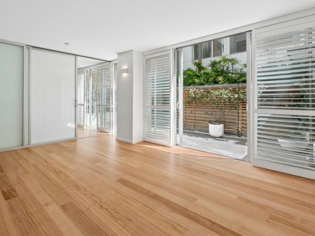 Sleek Executive Beach Pad in the Heart of the Village