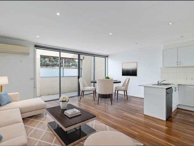 Sleek, Low Maintenance Living in a Prime Location!