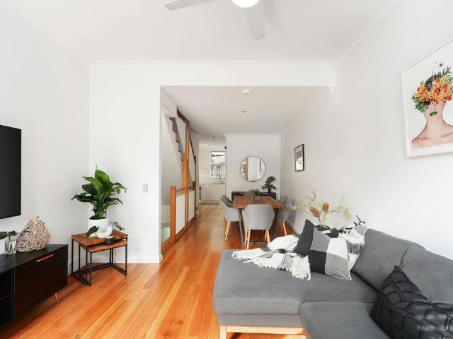 Sleek modern terrace partly furnished