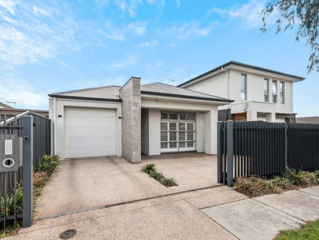 Sleek & Sophisticated 4 Bedroom Home with a Hint of Luxury
