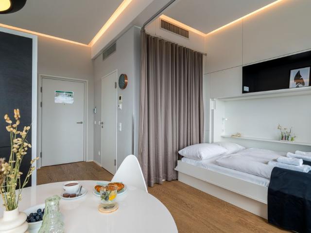 Sleep Above the Skyline – Modern Decor Apartment for 4 in Vienna’s Philips Haus, Vienna Amsterdam Apartments for Rent