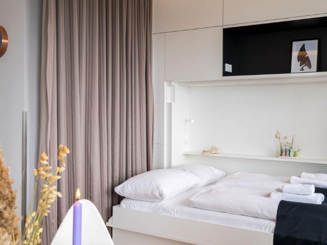 Sleep Above the Skyline – Modern Decor Apartment for 4 in Vienna’s Philips Haus, Vienna Amsterdam Apartments for Rent