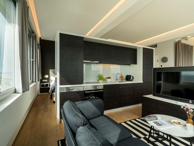 Sleep Above the Skyline – Modern Decor Apartment for 4 in Vienna’s Philips Haus, Vienna Amsterdam Apartments for Rent