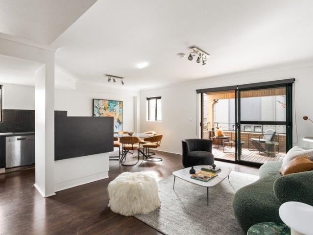 Smart and bright style in top floor dual level home