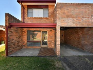 Smart Buying, Strong Returns Renovated Townhouse in a Convenient Location