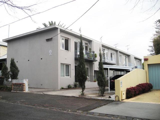 Smart First Floor Unit with Bay Views & Parking