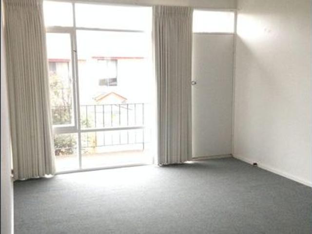 Smart First Floor Unit with Bay Views & Parking