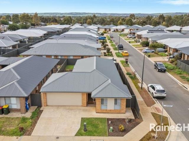 Smart Investment or Stylish Family Living in Sought After Andrews Farm