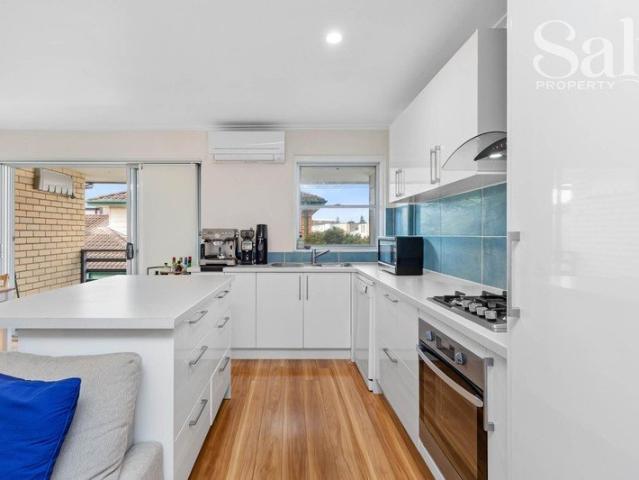Smartly Renovated Two Bedder in a Premier Beachside Pocket