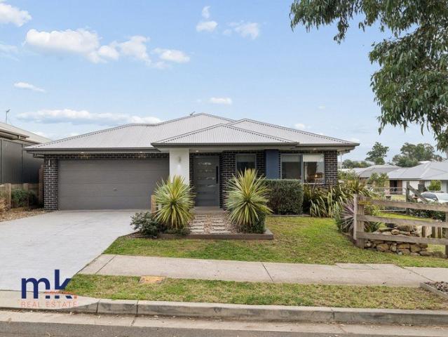 Modern Family Living on a Corner Block with Side Access Family, Investor or Down sizer Take Note