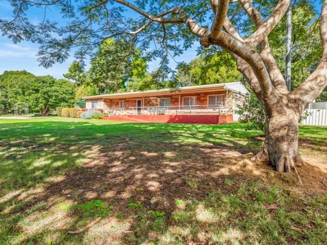 Space, Lifestyle & Exceptional Shedding on Six Acres of Town Acreage