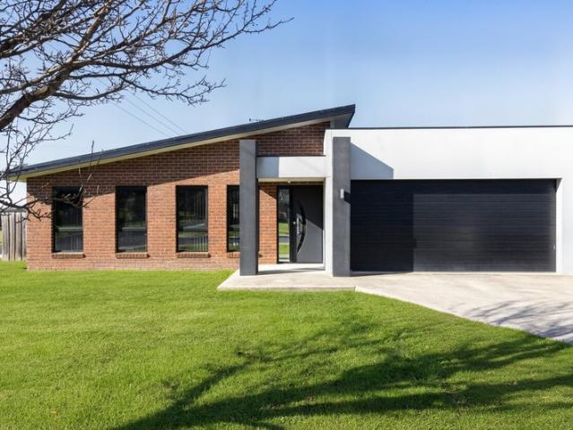 Space, Modern Comfort & a Backyard to Match