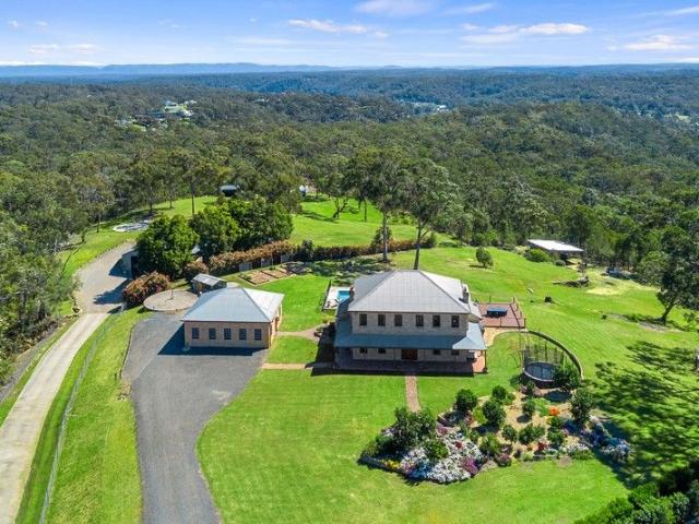 Elevated Acreage Living with Panoramic Views and Flexible Floorplan