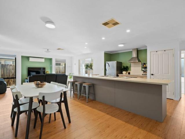 Space, Style & Family Living in Sought After Mariners Cove