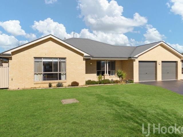 Space, Style & Serenity in Sought After Riverside Retreat