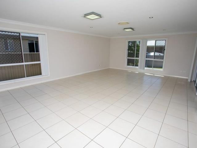 Spacious 4 Bedroom Brick Home with Excellent Shed & Outdoor Living
