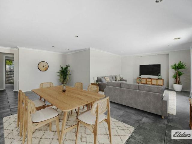 Spacious 4 Bedroom Brick Home with Two Living Areas
