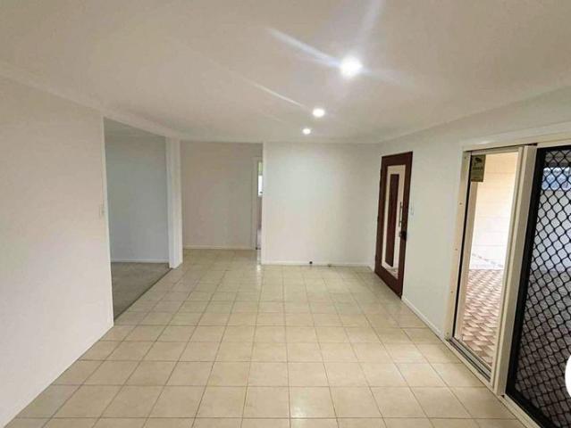 Spacious 4 Bedroom Brick Home with Teenage Retreat & Outdoor Entertaining Area Move in Ready!