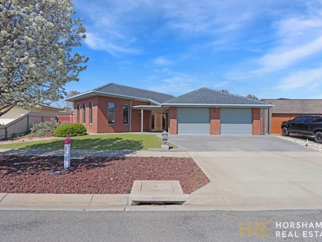 Spacious 4 Bedroom Brick Home Fully Furnished