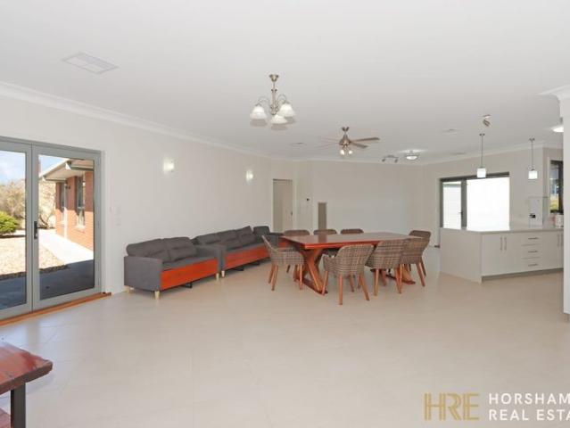 Spacious 4 Bedroom Brick Home – Fully Furnished